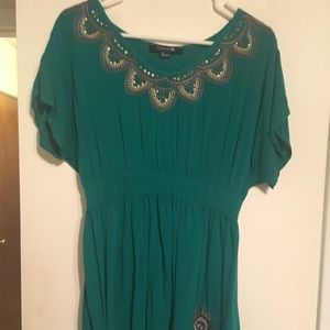 Green babydoll fit top with embroidery